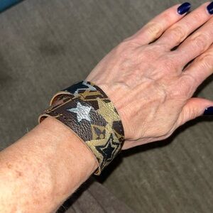 Fashion inspired leather wrap bracelet.  Two snaps for two lengths.